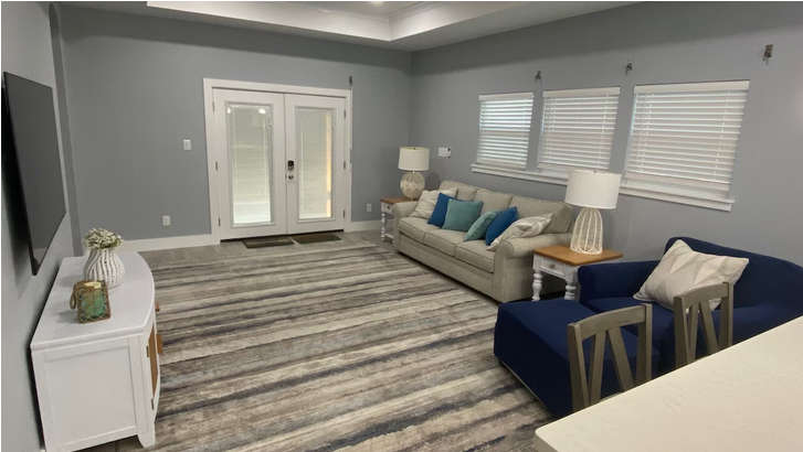 Living room with French doors to deck